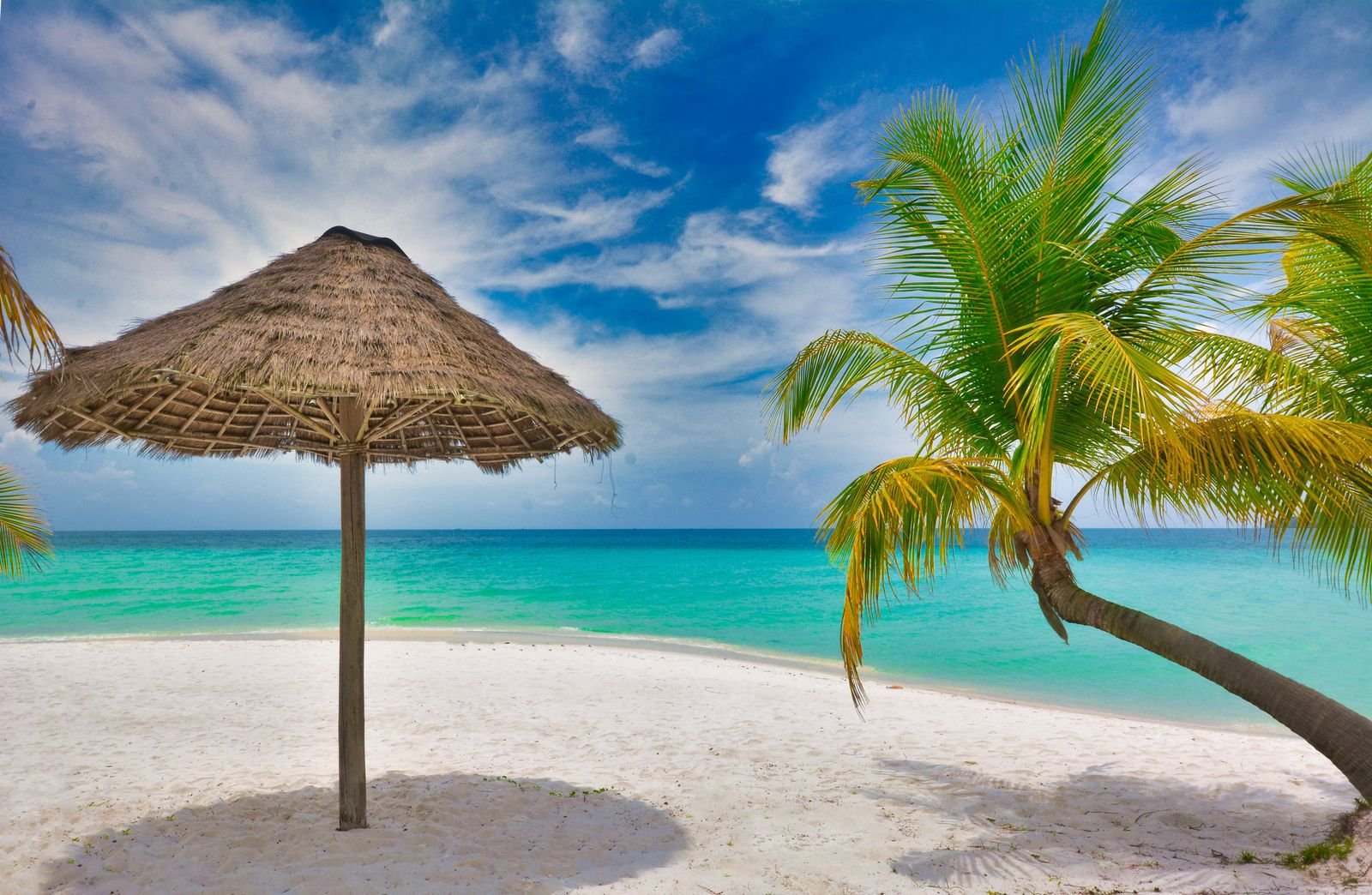 Turquoise water and palm trees on Koh Rong beach